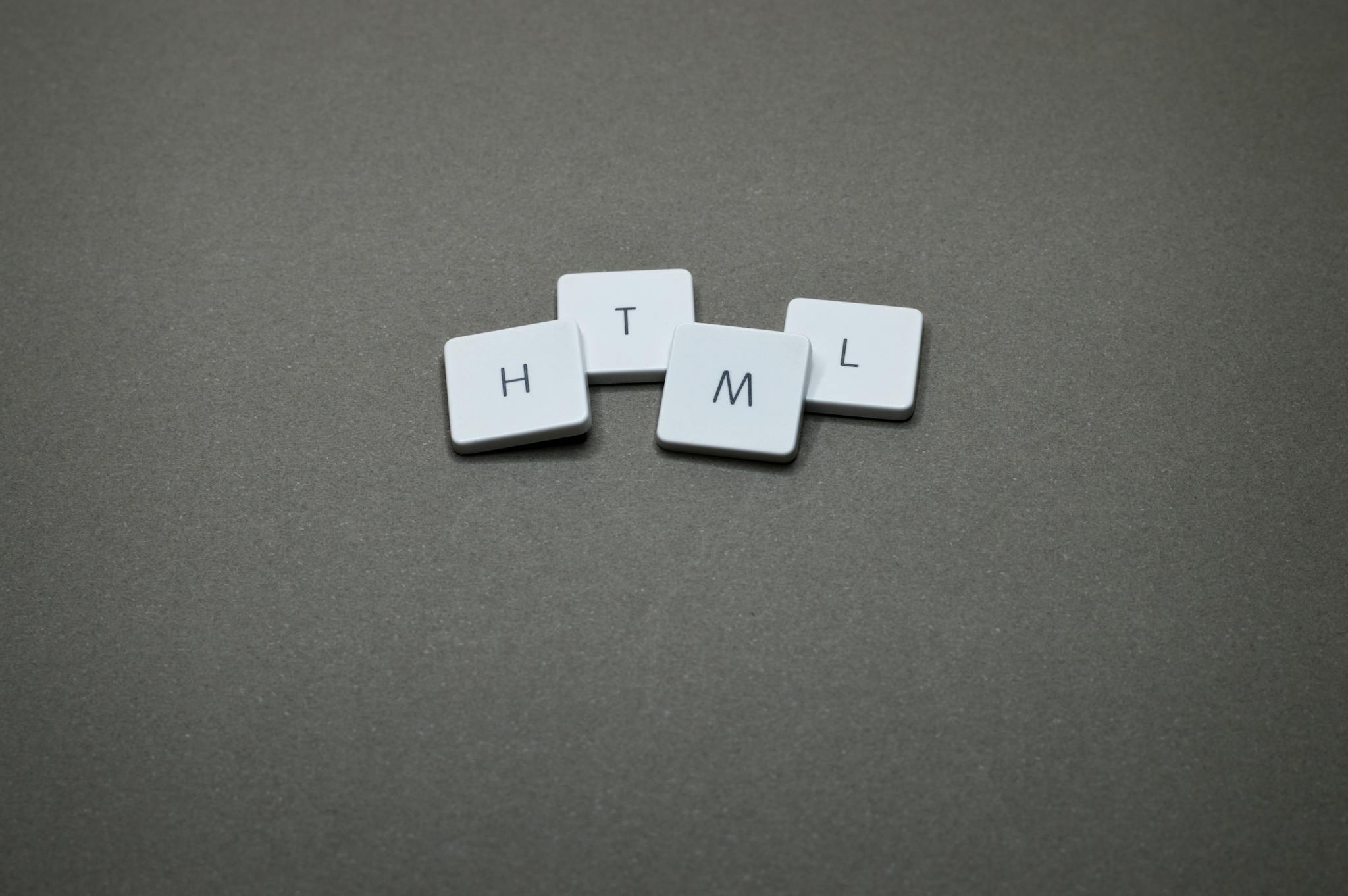 Minimalist Image Of Html Keycaps Against A